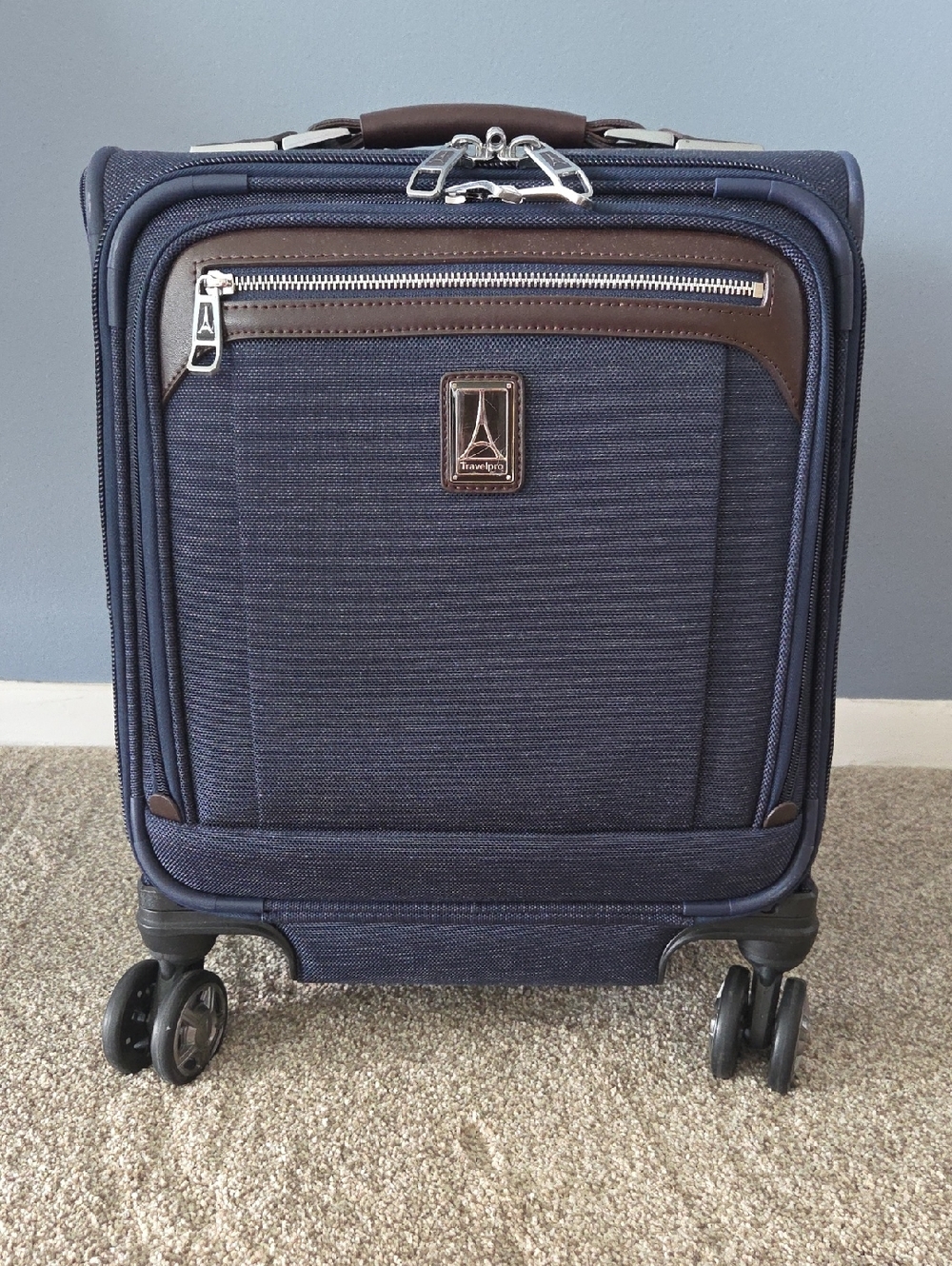 Travelpro Navy Carry-On Spinner with Brown Trim